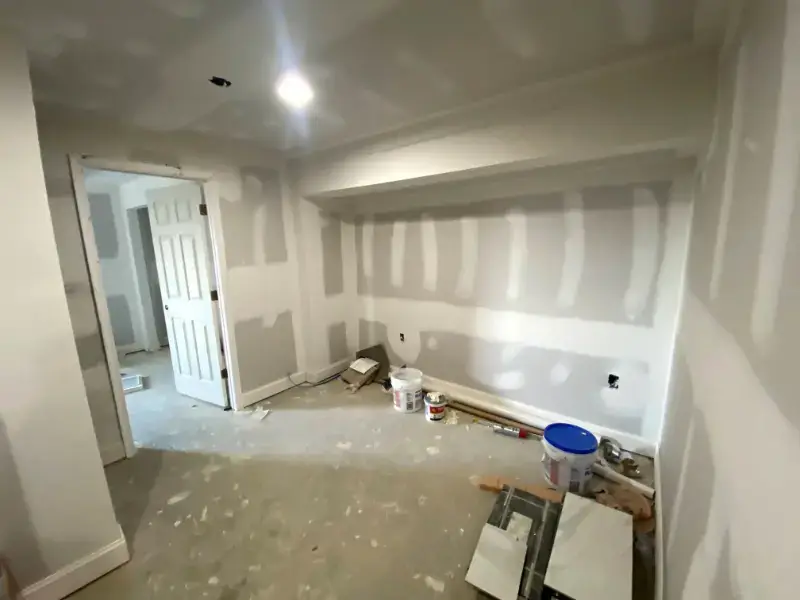 Leesburg basement renovation with rustic finishes and seating.