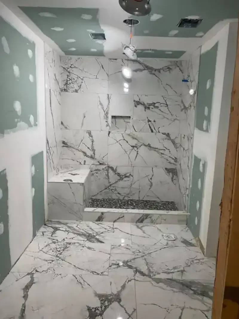 Fairfax, VA bathroom renovation with glass-enclosed shower.