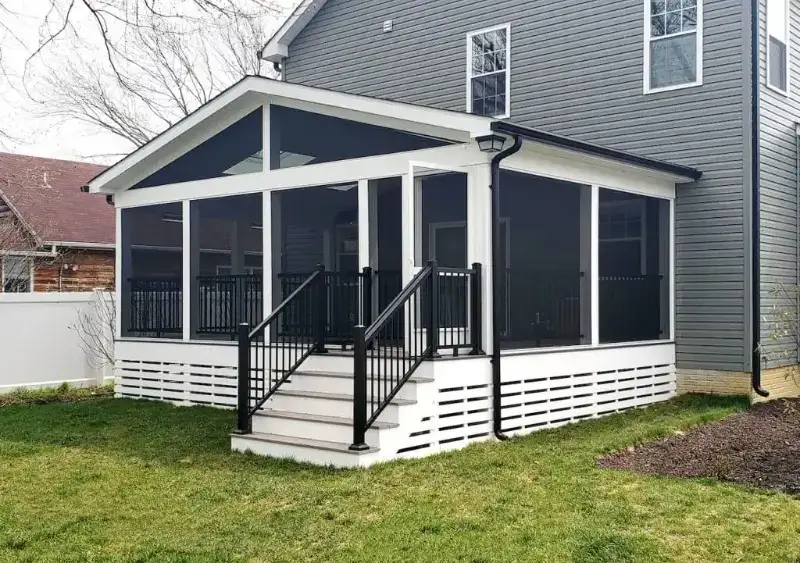 Covered porch renovation in Arlington, VA providing shade and comfort.