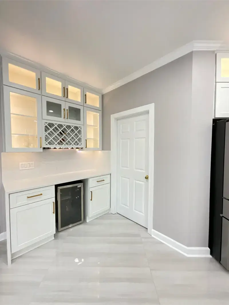 Full kitchen remodel in Alexandria, Virginia featuring modern finishes and an island with seating.