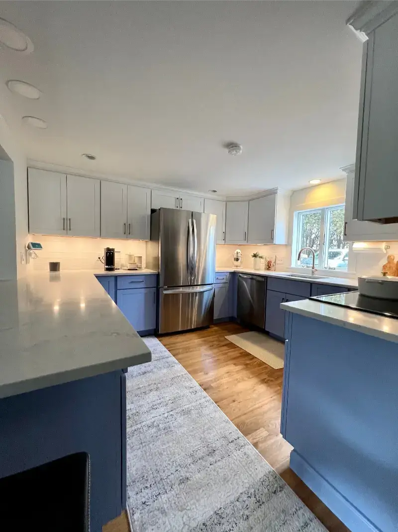 Bethesda, Maryland kitchen remodel with granite countertops and contemporary lighting.