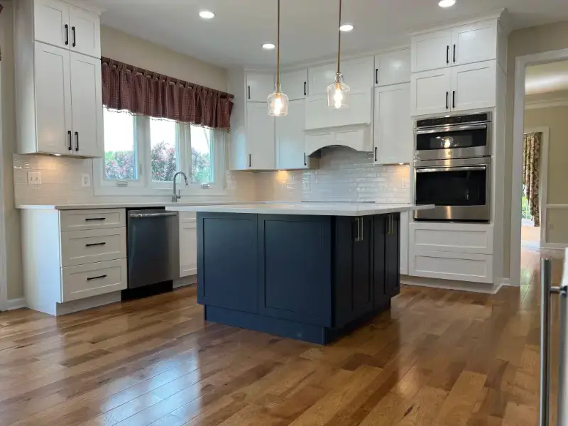 Luxury kitchen remodel in Fairfax, Virginia showcasing high-end appliances and marble countertops.