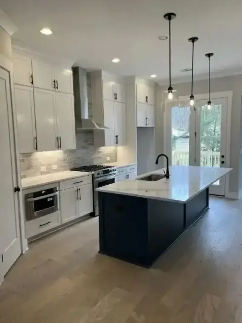 Open concept kitchen in Potomac, Maryland with a spacious layout and bright lighting.